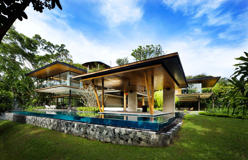 Guz Architects have designed the 'Ficus House', a modern residence in Singapore, that's been designed for a large family consisting of siblings, their families, and a parent. #Architecture #ModernHouse #Landscaping #LandscapeDesign