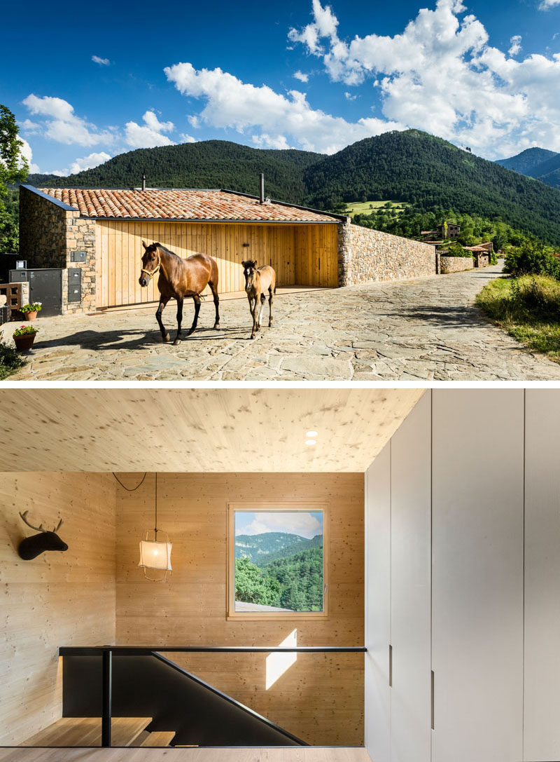 A wood garage and front door blend in seamlessly to the surrounding wood wall, while the entryway provides access to stairs that lead down the main living areas of the house. #Garage #Architecture #Stairs #Window