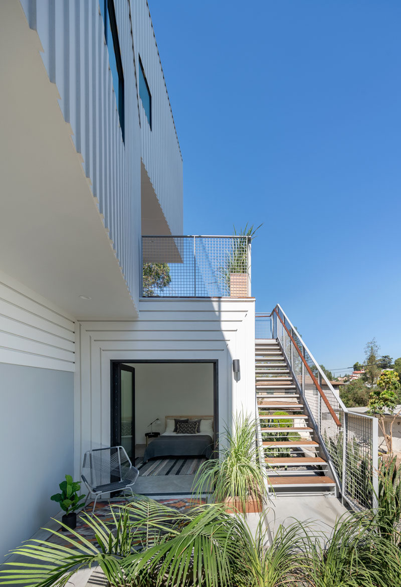 This modern four storey house has an accessory dwelling unit (ADU) that's incorporated into the house on the second level, between the garage and the upper levels. #Architecture #OutdoorSpace #ExteriorStairs