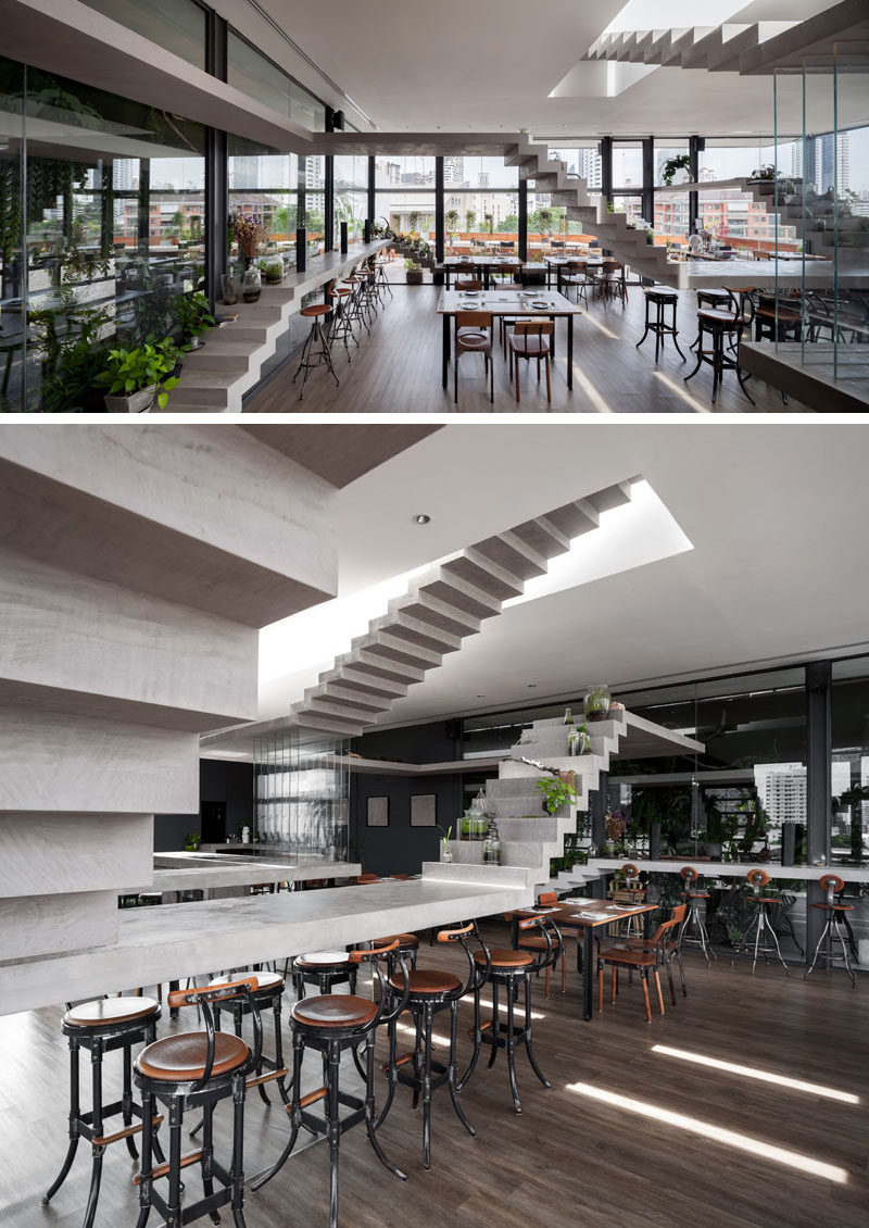 This modern restaurant uses loops of concrete stairs to create different functions throughout its design, like seats, tables,a bar, and communal areas. #RestaurantDesign #BarDesign #Stairs #ConcreteStairs