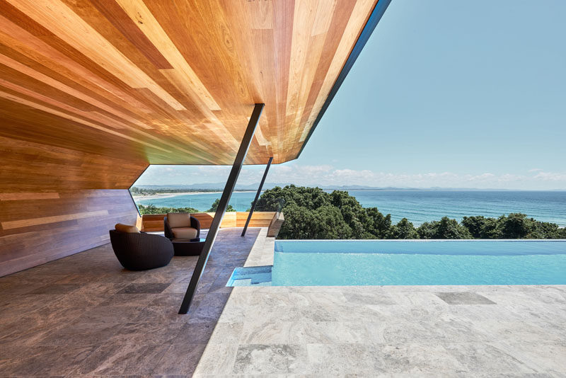 Harley Graham Architects have designed a modern pool cabana, that's clad in wood (Blackbutt), and takes the shape of a wave. #PoolCabana #ModernCabana #SwimmingPool