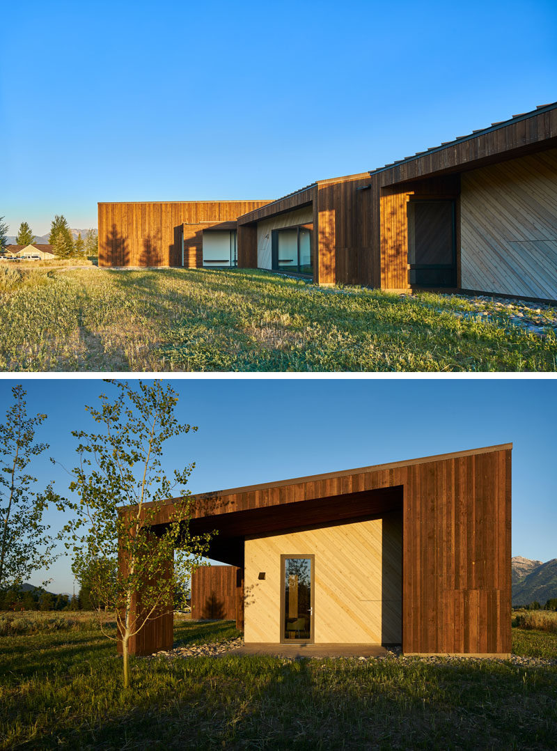 The two-tone exterior of this modern house has been created with the use of rich dark-brown vertical Douglas Fir and lighter horizontal Cedar, allowing the home to meld into the native woody sage-brush surrounding the home. #WoodHouse #WoodCladding #WoodSiding #ModernHouse #Architecture