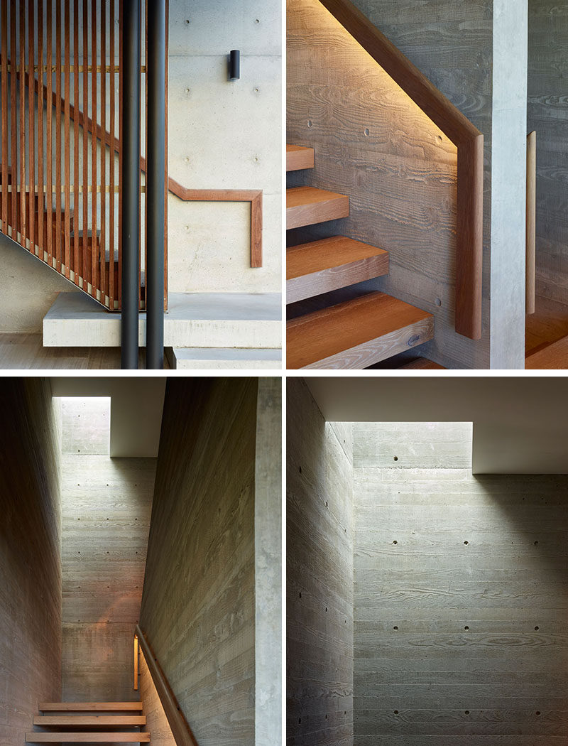 Wood stairs with a matching wood handrail connect the various floors of this modern house. At night, hidden lighting can be turned on to highlight the handrail, while board-formed concrete provides an interesting wall texture. #Stairs #Hanradil #CocnreteWalls