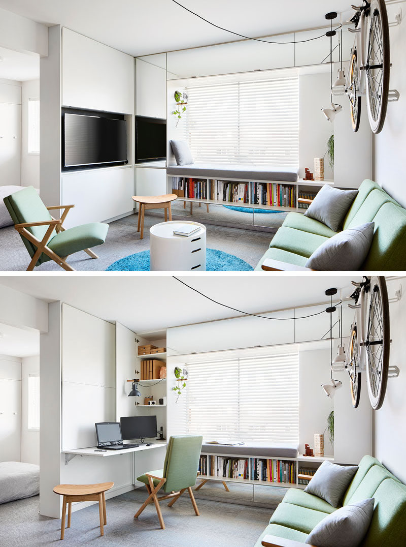 The living room in this modern apartment also doubles as a home office / study, with the desk, computers, and lighting, hidden behind cabinet doors when not in use. #ModernApartment #ModernHomeOffice #SmallLivingRoom #HomeOffice