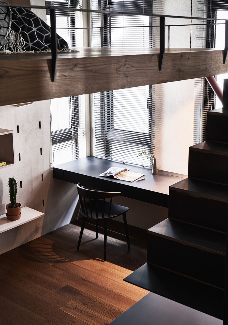 This small apartment has a desk that's positioned by the windows to take advantage of the natural light. #HomeOffice #Desk