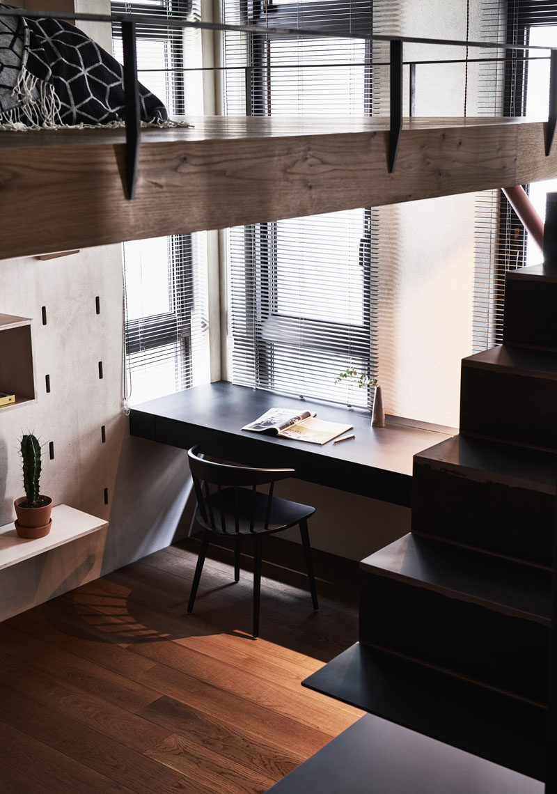 This small apartment has a desk that's positioned by the windows to take advantage of the natural light. #HomeOffice #Desk