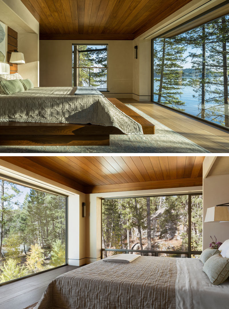 This contemporary master bedroom was envisioned with a low wood ceiling to provide a sense of privacy in contrast to the walls composed almost entirely of glass on two sides. #Windows #MasterBedroom #WoodCeiling