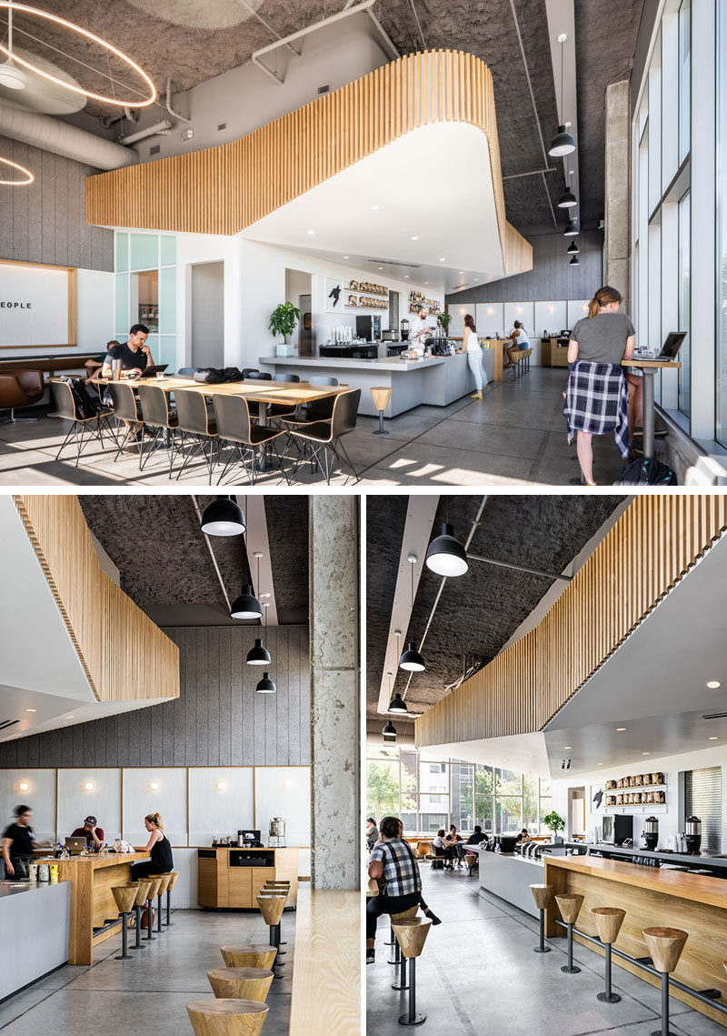 The main focal point of this modern coffee shop / cocktail bar, is the sculptural white volume above the service area that's clad in wood slats made from alder. #CoffeeShop #CocktailBar #InteriorDesign #CafeInterior