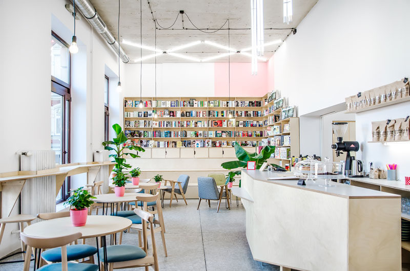 Atelier Starzak Strebicki have recently completed Kahawa, a combined coffee house and bookshop in Poznan, Poland, that's located within an a former milk bar. #CoffeeShop #BookShop #InteriorDesign