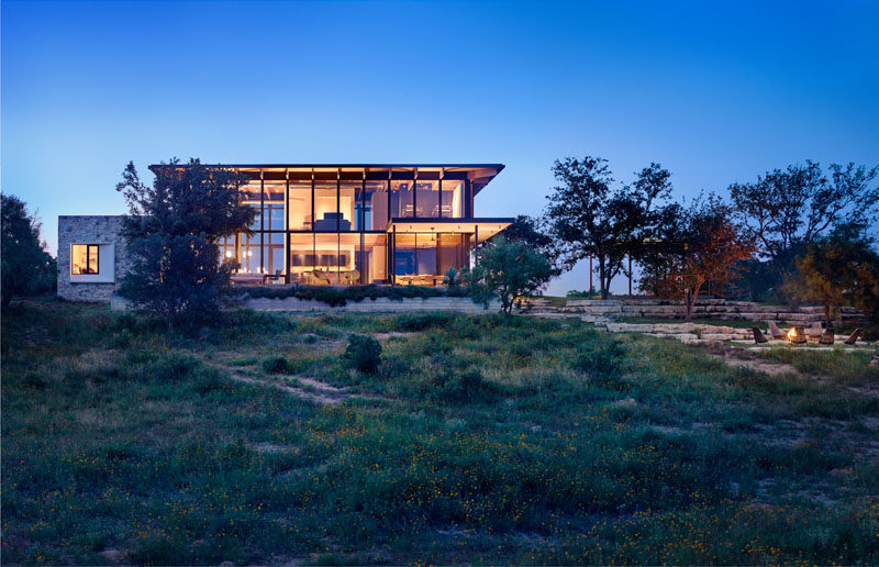 Michael Hsu Office Of Architecture have designed a new modern weekend house in Mason, Texas, that's located on and inspired by an old family campsite. #Architecture #ModernHouse