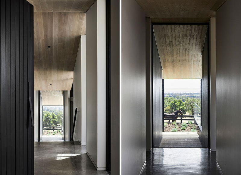 Inside this modern farm house, there's a sense of warmth throughout the house with the use of a soft oak lined ceiling, that also provides a connection to the rural landscape outside. #WoodCeiling #Windows