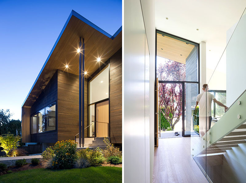 The sloped roof of this modern house creates a tall, light filled living space on the main floor of the house. #ModernHouse #SlopedRoof #FrontDoor #Entryway