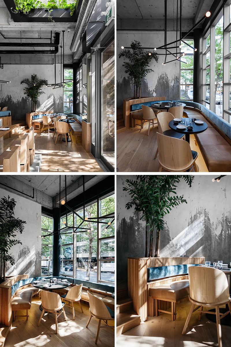The seating along the front of this modern restaurant makes use of the natural light from the large windows, while curved banquette seating creates a casual and comfortable environment. #RestaurantDesign #RestaurantSeating #BanquetteSeating