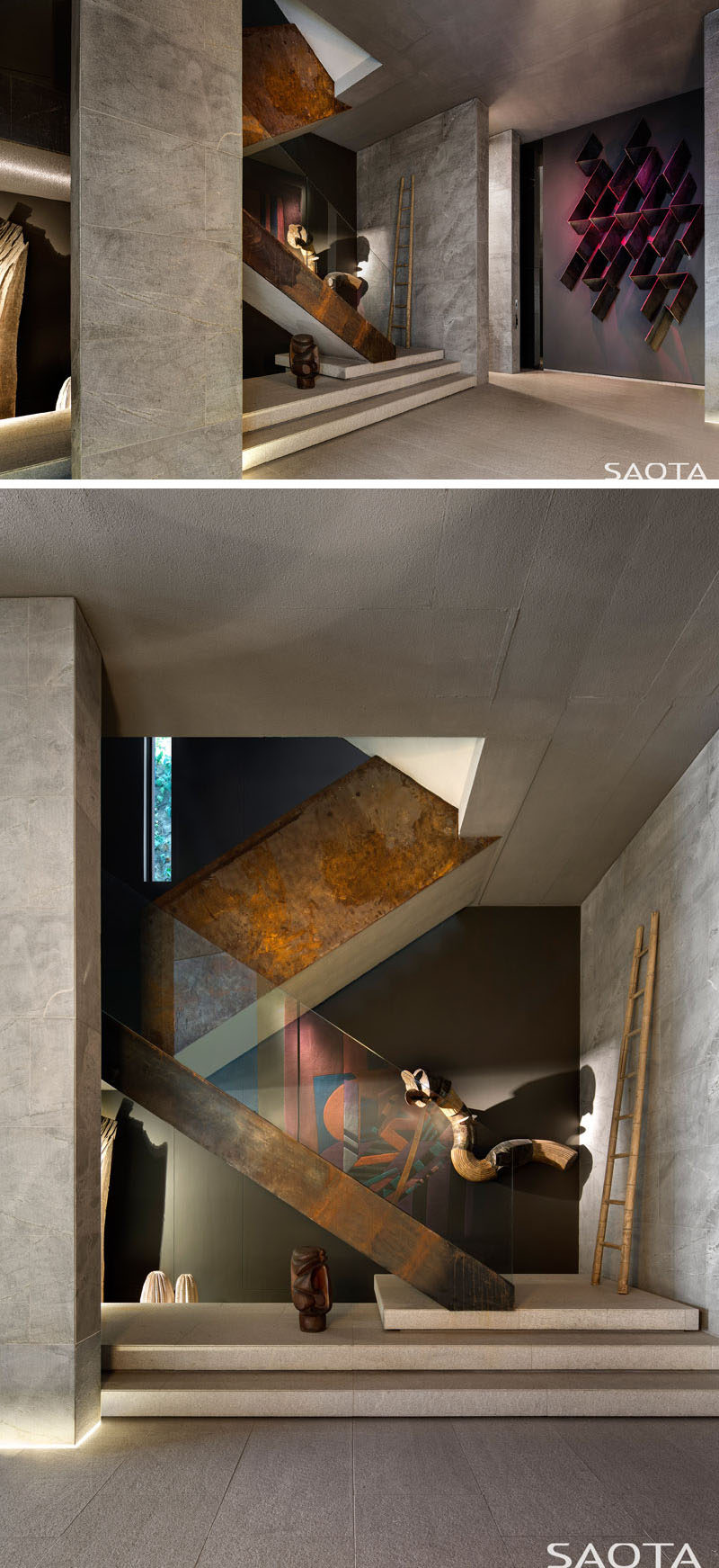 This modern house has a double volume art-filled entrance foyer that has a rusted steel and glass staircase. #EntranceFoyer #ModernInterior #Stairs #RustedSteelAndGlassStairs