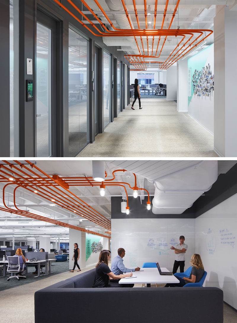 Studio BV have designed the Field Nation offices that were inspired by a circuit board and features orange conduit piping throughout, guiding people to the various areas of the office. #InteriorDesign #OfficeDesign #DesignAccent