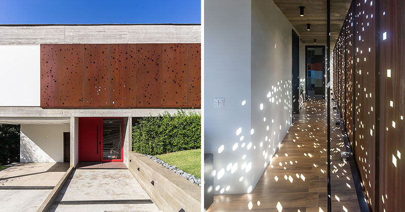 PJV Arquitetura have designed a modern concrete house that has an artistic perforated weathering steel screen to provide privacy and shade. #Architecture #WeatheringSteel #SteelScreen