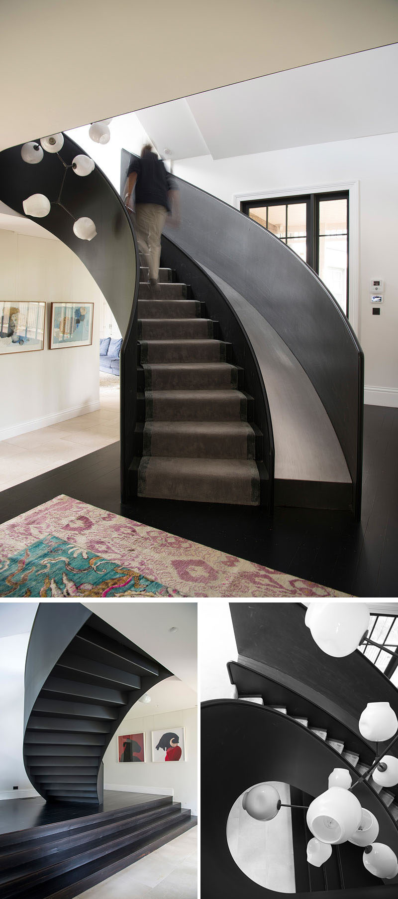 This modern house has a curved steel staircase with a slide that connects the main floor with the upper level, that's home to the kids’ bedrooms and a rumpus / playroom. #Stairs #StairsWithSlide #Staircase