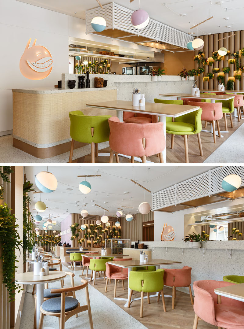 Light purple, blue, lime green, and pink have been used to add pops of color to the design of this modern restaurant. #RestaurantDesign #InteriorDesign #ModernRestaurant