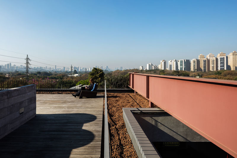 This modern house has a rooftop deck that overlooks nearby wetlands. #Architecture #RooftopDeck