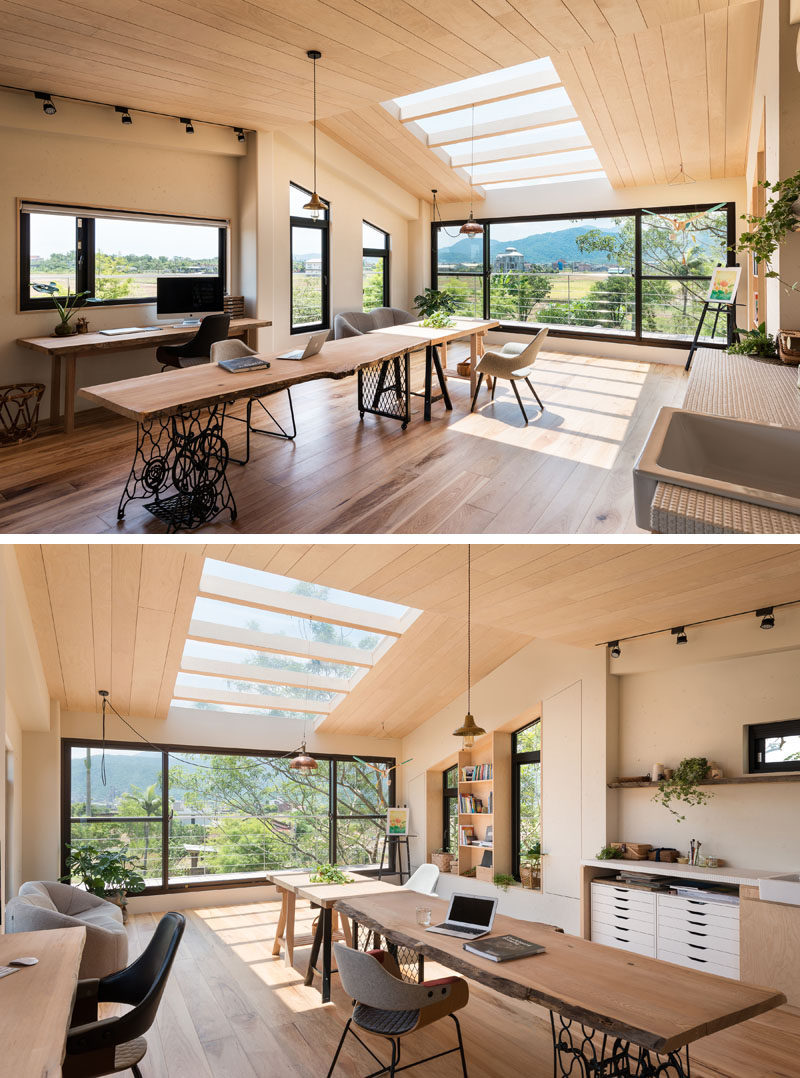 Plenty of windows in this lofted studio provide views of the farmland outside, and skylights provide plenty of natural light. #Studio #HomeOffice #Windows #Skylight