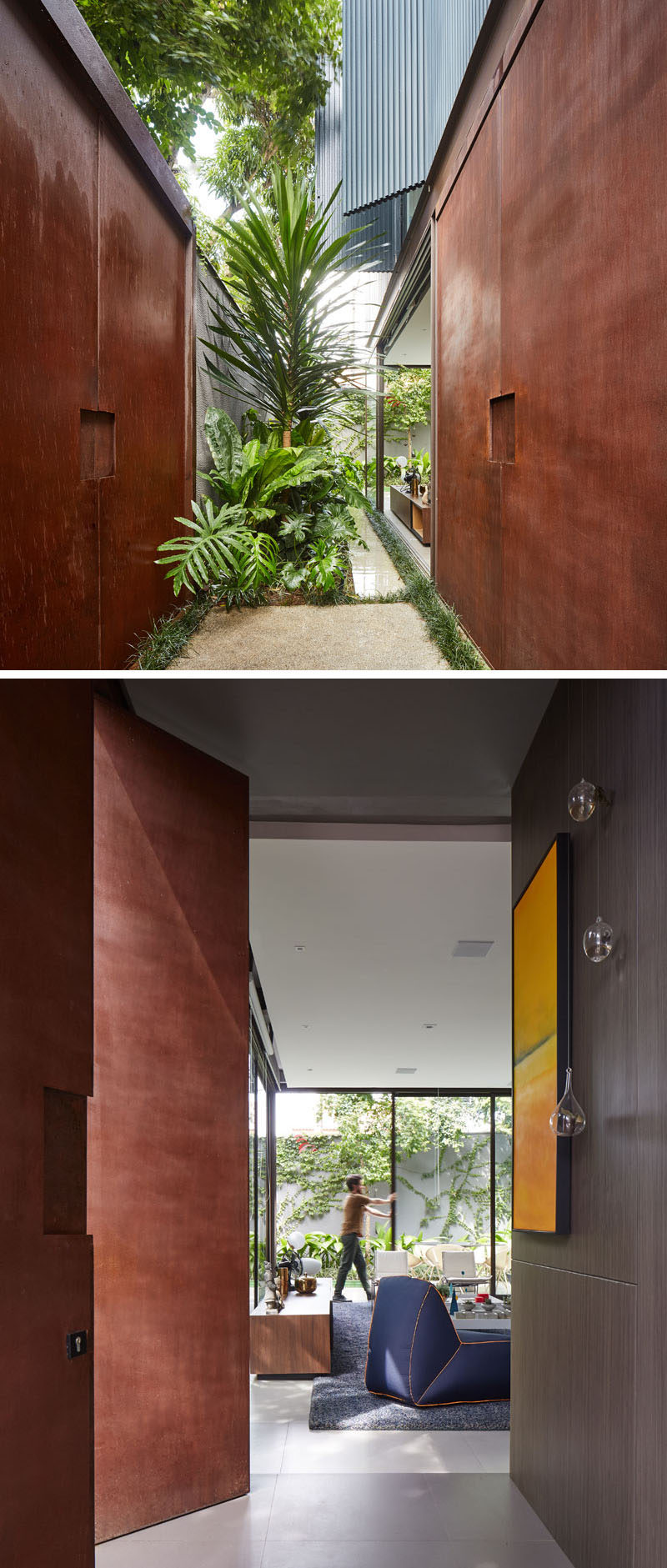 The large weathering exterior steel gate on this modern house opens to reveal an entryway with a garden and access to the interior through additional weathering steel pivot doors. #WeatheringSteelDoors #FrontDoor #Garden