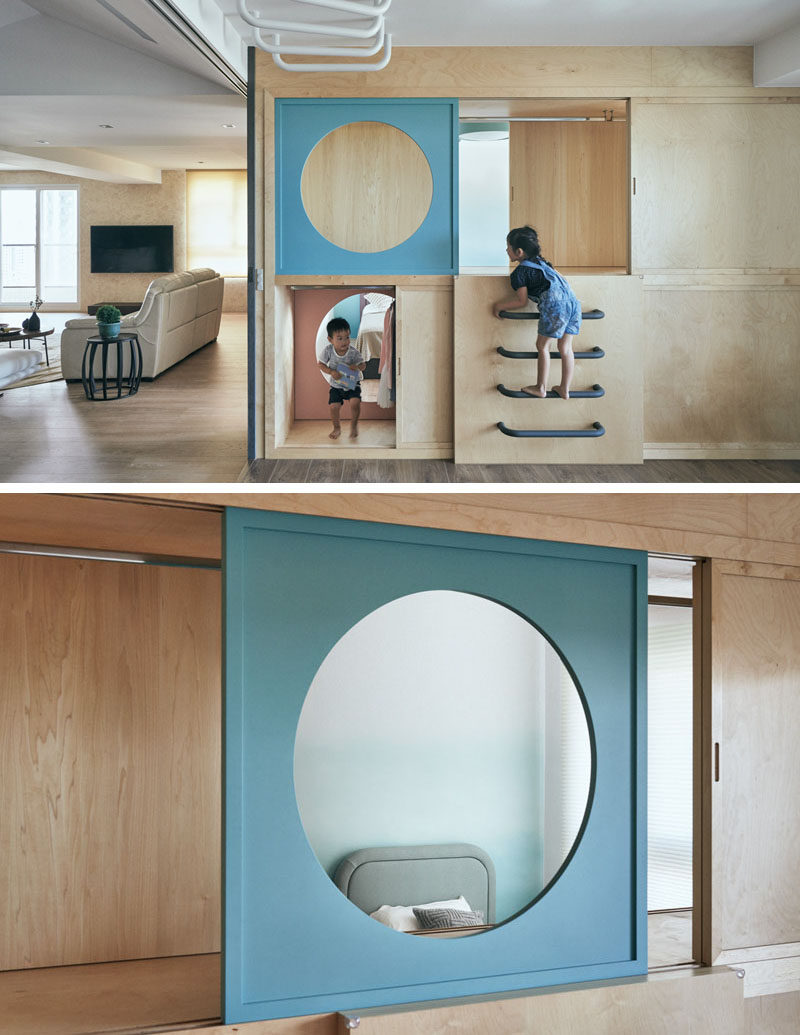 HAO Design have created a unique wardrobe that connects a play room with the children's bedroom. Round-shaped doors allow the children to easily pass through between the rooms, and evoke the joy of playing hide-and-seek. #InteriorDesign #Wardrobe #Closet #Playroom