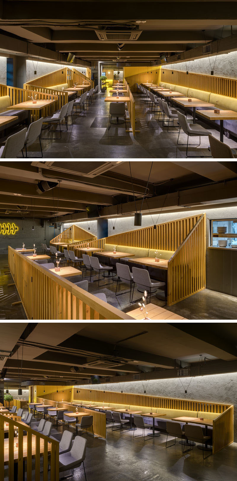 The seating in this modern restaurant and bar is designated with angled wood slat partitions, while banquette seating lines the walls, and hidden lighting gives a soft glow to the dining room. #RestaurantDesign #Interiors #BarDesign