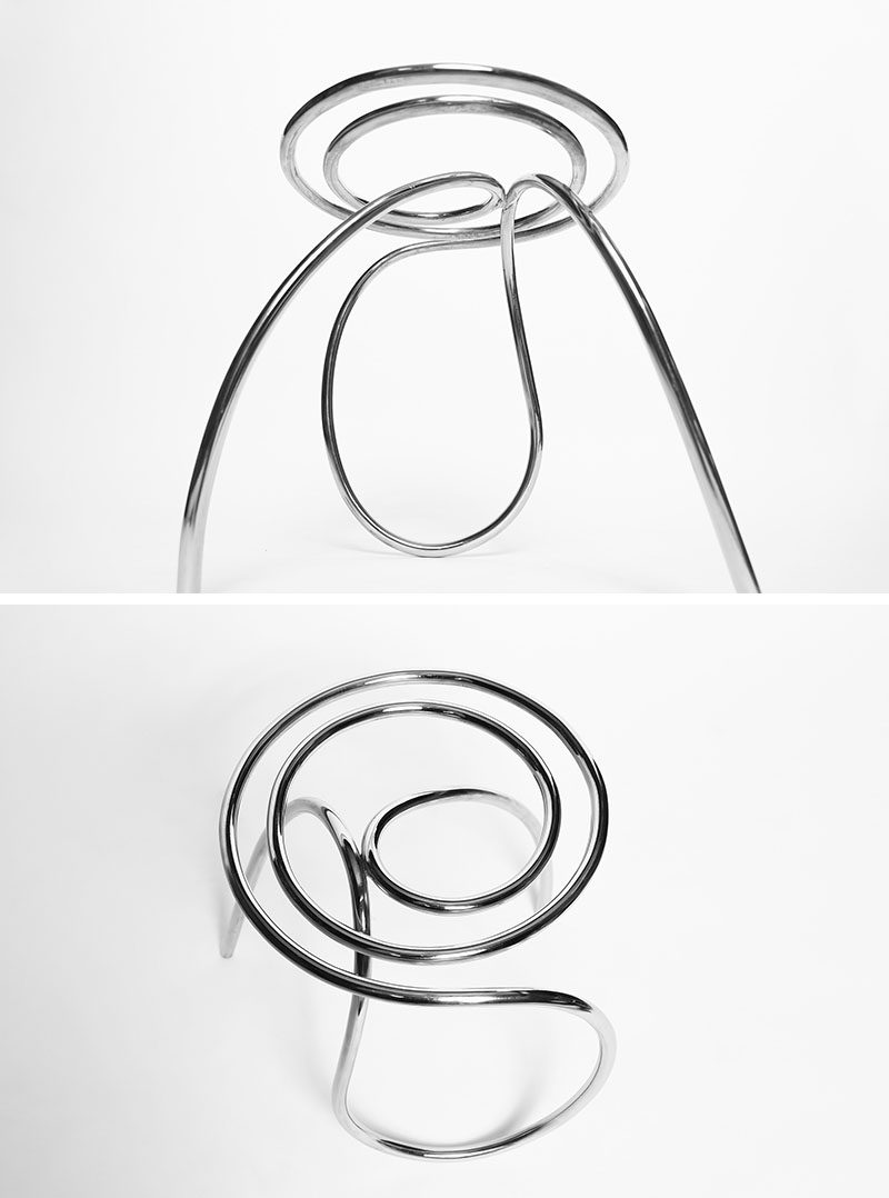 XYZ Integrated Architecture have designed a unique and sculptural stool, that's made from curved stainless steel. #Seating #Stool #Furniture #Design