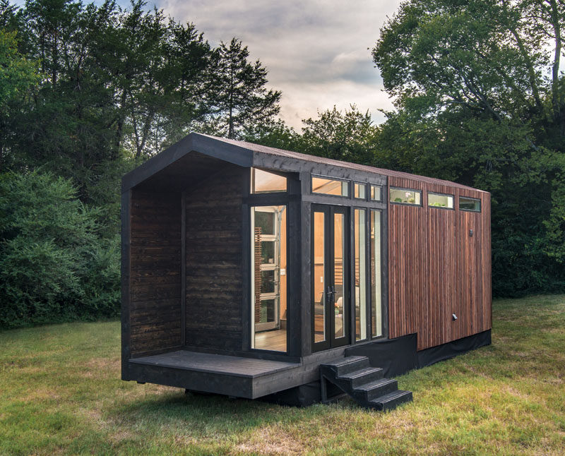 New Frontier Tony Homes have designed the Orchid Tiny House, that has a contemporary, gable farmhouse design. #TinyHouse #TinyHome #Architecture #Design #InteriorDesign