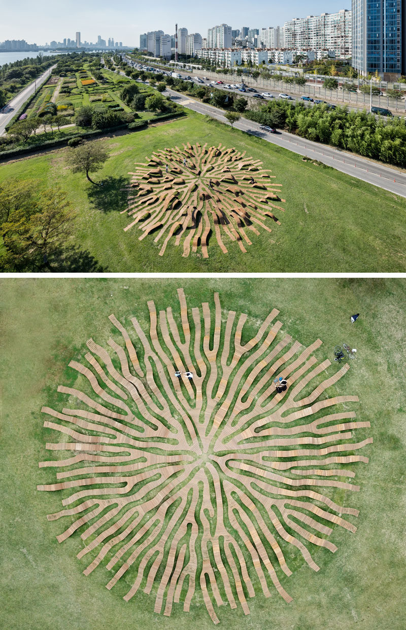 Yong Ju Lee Architecture have designed the Root Bench, a circle-shaped piece of public furniture that has a diameter of 30m, is installed in grass, and has the shape that's inspired by a root spreading throughout the park. #PublicFurniture #Art #Sculpture #Design