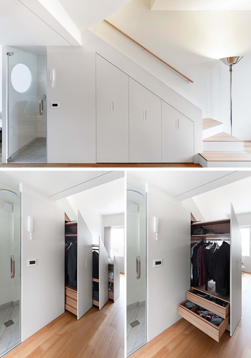 This small and modern apartment hides storage beneath the stairs. #Storage #Closet #UnderStairStorage #Stairs