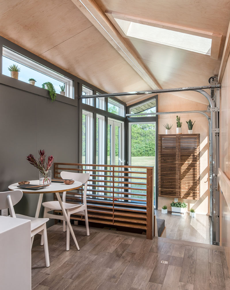 The interior siding of this tiny house is all maple plywood and combines a modern look with a warm, natural feel. #TinyHome #TinyHouse #ModernInterior