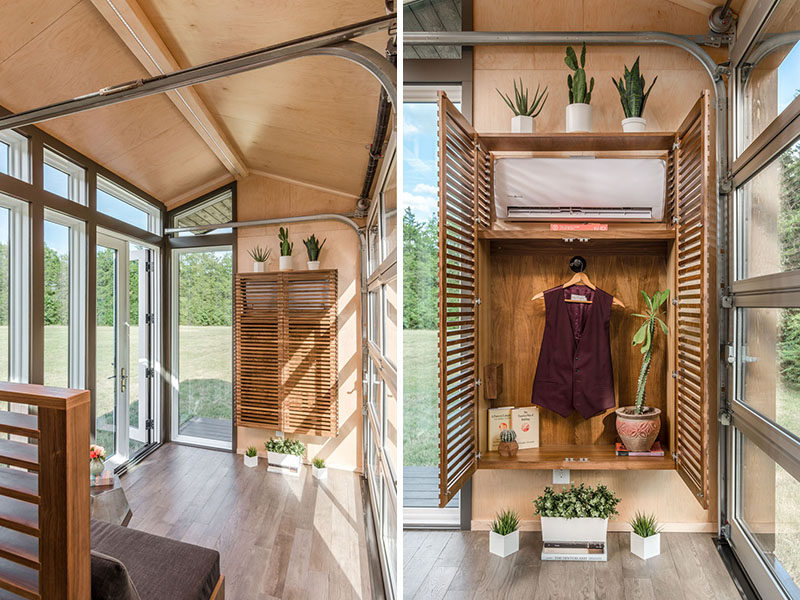 Inside this tiny house, the gabled ceiling gives the feeling of space, and beside the front door, a floating closet with wood slat doors hides the air conditioner and provides a place for hanging clothes. #Storage #Closet