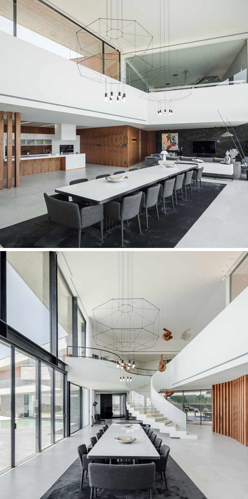 Central to the interior of this modern house is the main dining area, that takes advantage of the double-height ceiling, by having two minimalist geometric chandeliers hanging above a large dining table. #LargeDiningTable #DoubleHeightCeiling #InteriorDesign