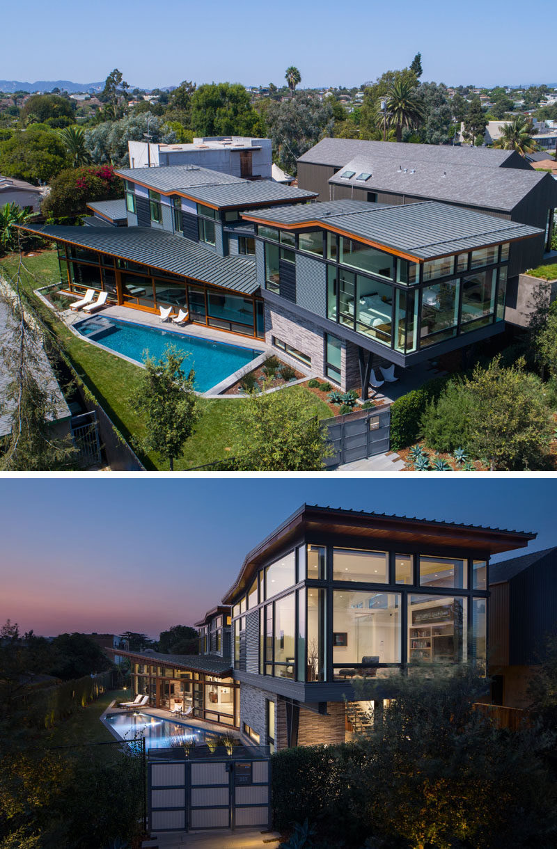 This modern house is comprised of a dramatic series of folded roof planes, and a collage of textured metal and wood exterior surfaces. #ModernHouse #HouseDesign #ModernArchitecture