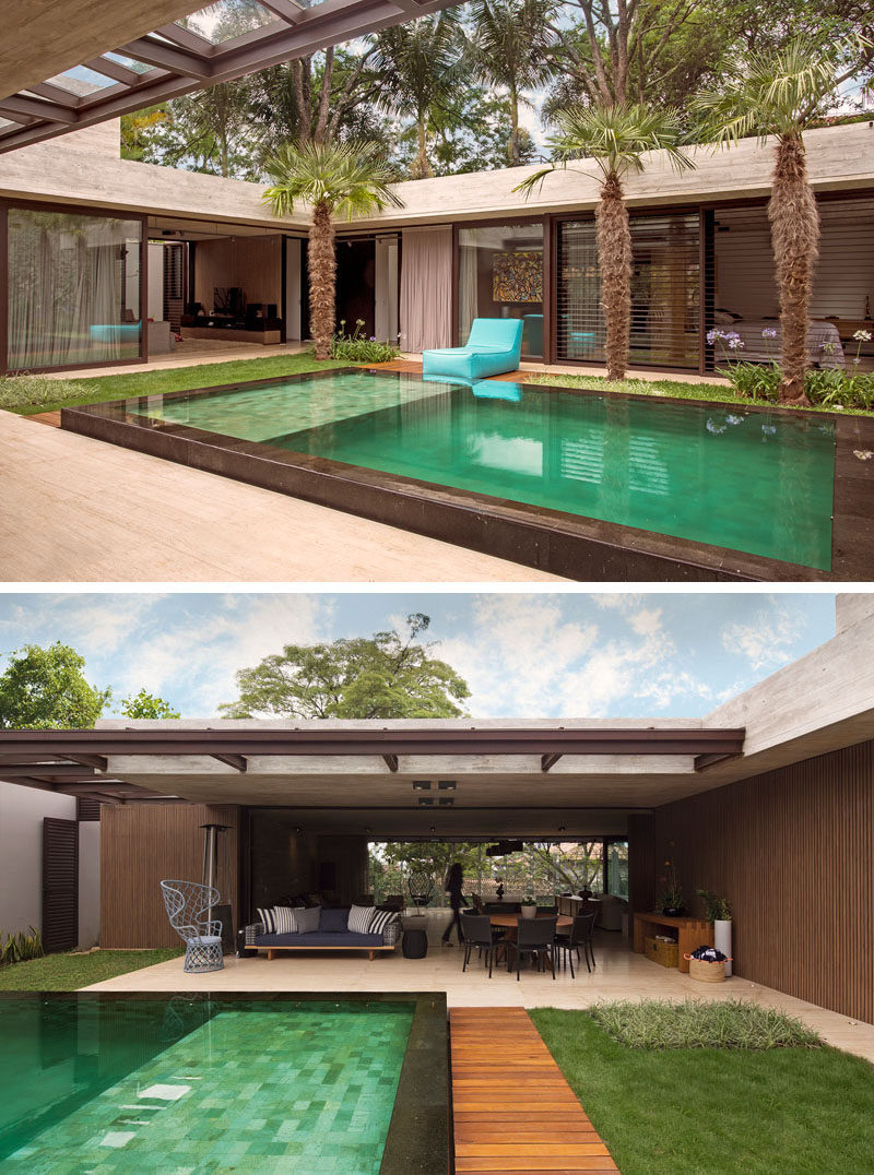 Upon entering this modern house, the courtyard is accessible from all of the different rooms, and outdoor seating areas provide additional space for entertaining. #ModernHouse #Courtyard #SwimmingPool