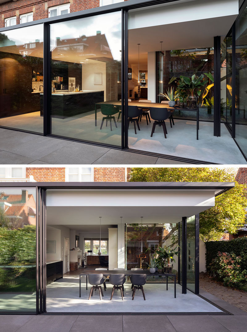 Bloot Architecture have designed a minimalist house extension in The Netherlands, that contrasts the brick architecture of a 1927’s house. #GlassWalls #ModernHouseExtension #Architecture