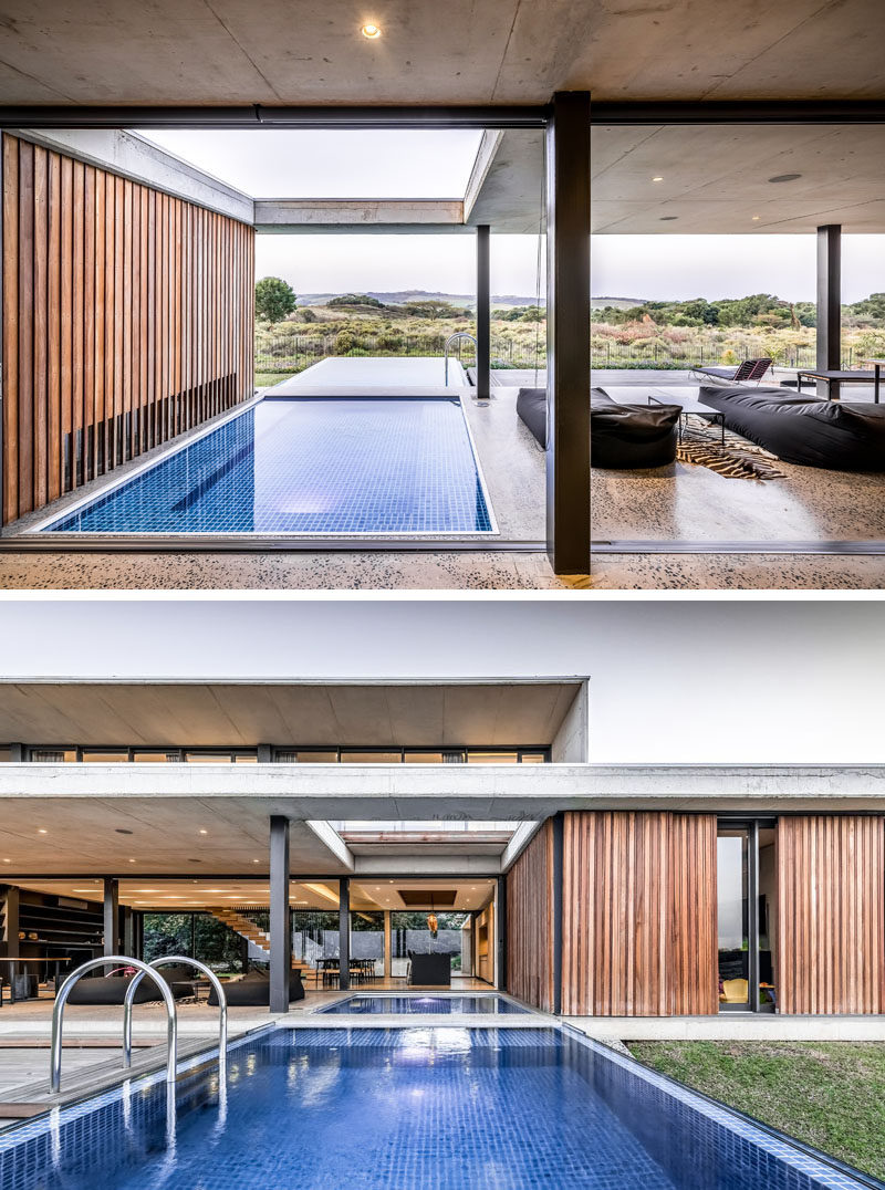 The lines between interior and exterior spaces of this modern house are blurred, creating an indoor/outdoor living environment. #ModernArchitecture #SwimmingPool