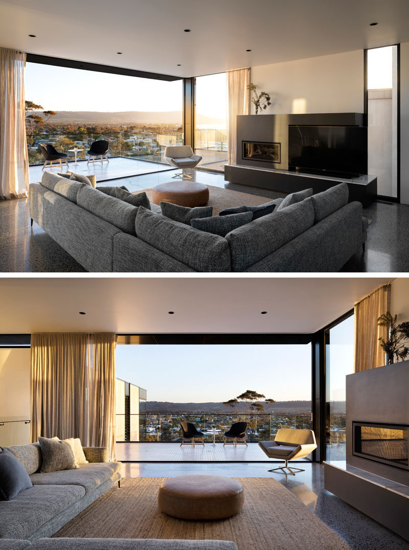 Inside this modern house, a neutral color palette has been used to create a relaxed atmosphere, while large sliding doors connect the living room with the balcony. #LivingRoom #InteriorDesign