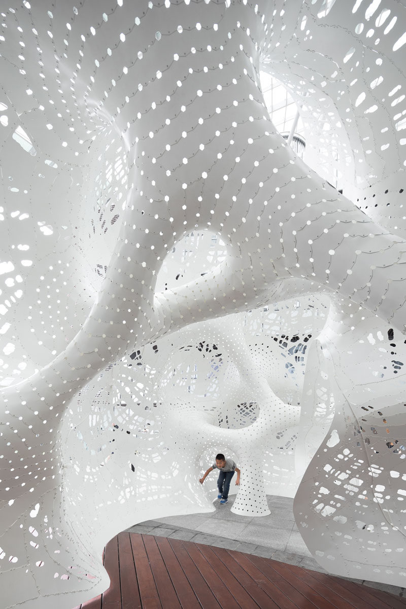 MARC FORNES / THEVERYMANY designed a large-scale sculptural outdoor pavilion on the elevated plaza of the Suzhou Center in China, as part of the Jinji Lake Biennial. #Art #Sculpture #PublicInstallation