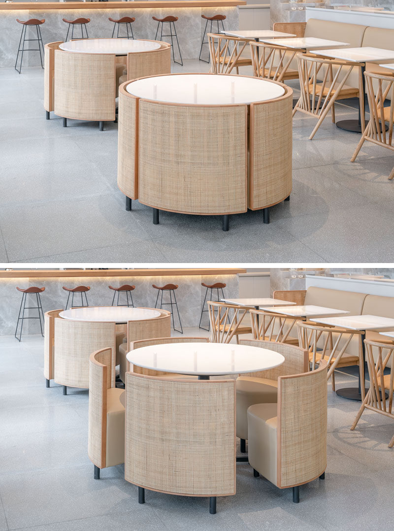 This custom designed table and chairs set, inspired by the shape of a cake, creates seating for diners, however the chairs can be tucked away under the table when there's a party, and the set can then be used as a display table. #Furniture #RestaurantDesign