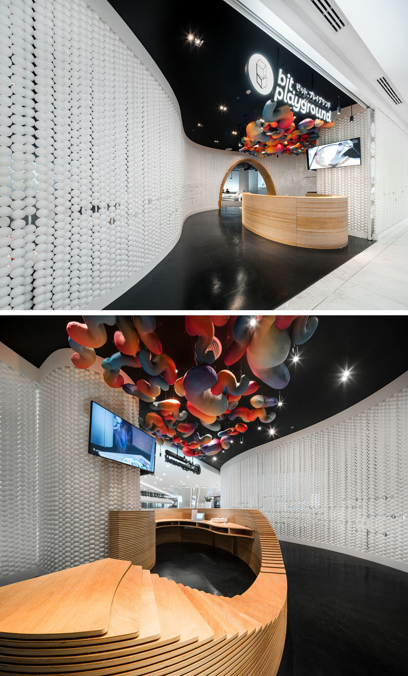 Walls made up of white balls gives this modern playspace a unique and eye-catching appearance. #RetailDesign #Walls #InteriorDesign