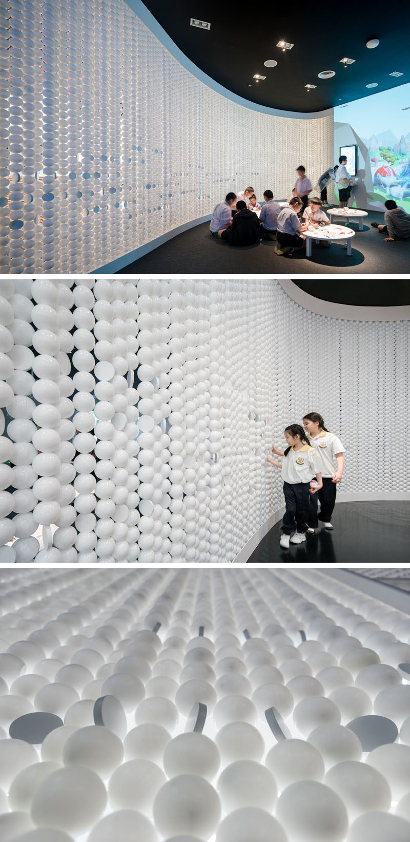 Walls made up of white balls gives this modern playspace a unique and eye-catching appearance. #RetailDesign #Walls #InteriorDesign