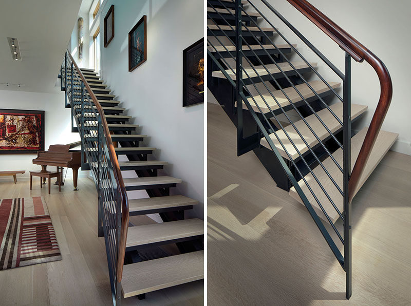 A steel and wood staircase connects the different levels of this modern house. #Stairs #SteelStairs #Staircase