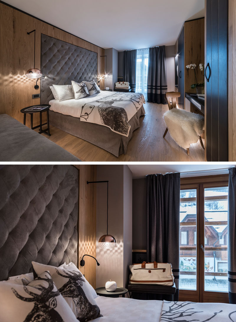 This modern hotel room features upholstered headboards that are built into the wood walls. #Bedroom #Headboard #InteriorDesign