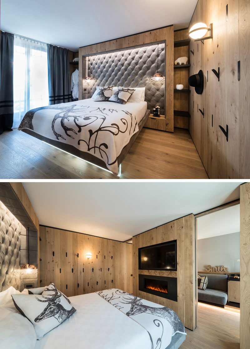 This modern hotel room features upholstered headboards that are built into the wood walls. #Bedroom #Headboard #InteriorDesign
