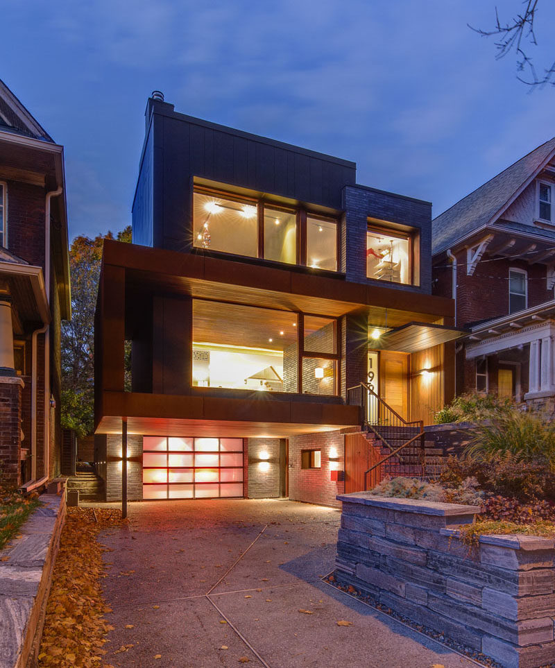 Altius Architecture have designed a contemporary house in Toronto, Canada, that features three stories at the front of the house and four stories at the back. #Architecture #InteriorDesign #ModernHouse