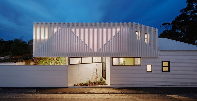 Architecture firm WALA have designed the renovation and addition of a dilapidated double-fronted Victorian house, that's a heritage listed building located in a suburb of Melbourne, Australia. #ModernExtension #Architecture #Garden