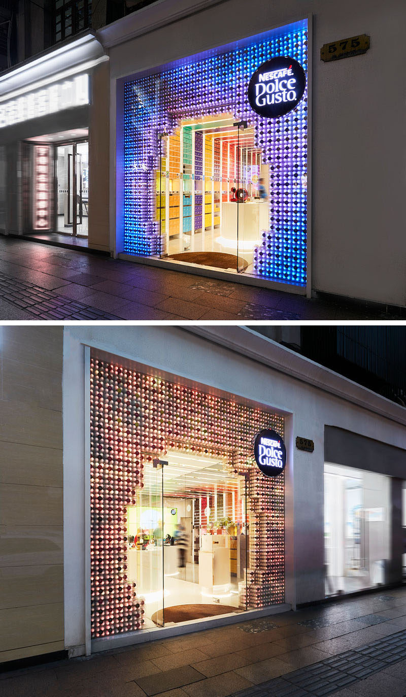 The facade of this modern store is composed of 3000 coffee capsules, which has the ability to change color with the use of programmable LED lights, which are located within 1000 white capsules, making each of them like a single pixel. #RetailStore #RetailDesign #StoreFacade