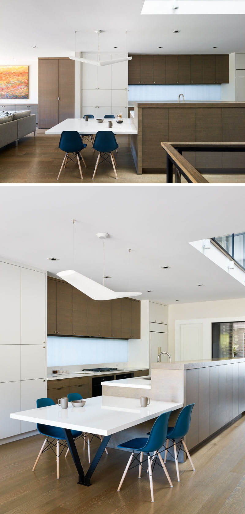 In this kitchen, a combination of wood and light-colored cabinets create a contemporary appearance, and an extension of the kitchen island allows a casual dining experience. #KitchenDesign #ContemporaryKitchen